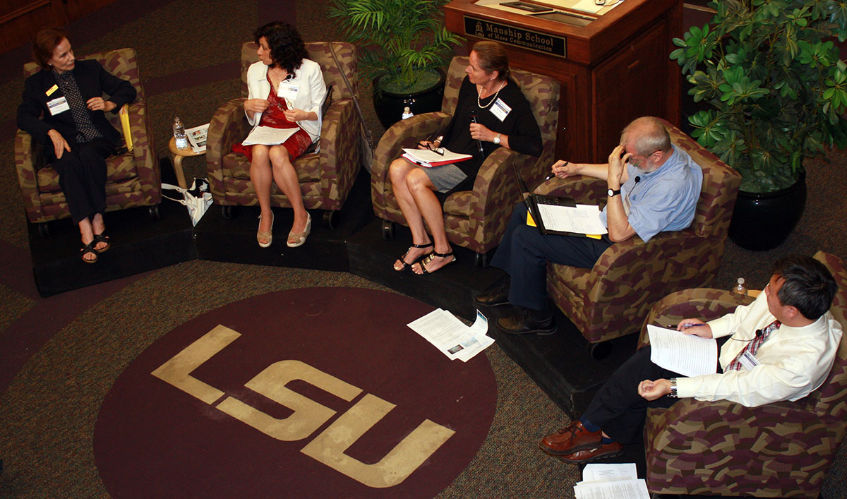 images of speakers at the symposium taken from aerial view