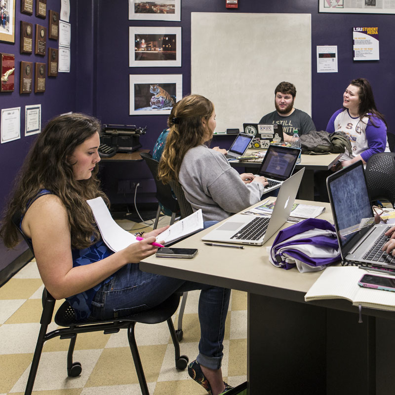 Student reporters for the Reveille work in the Student Media Office=