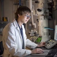 Student works on project in lab. 